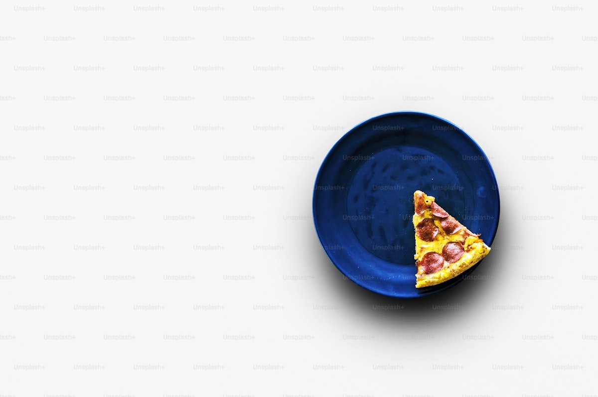 Counter of a Venetian pizza al taglio shop with various pizza slices on display